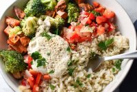 Roasted Sweet Potato Bowl with Quinoa and Tahini Dressing