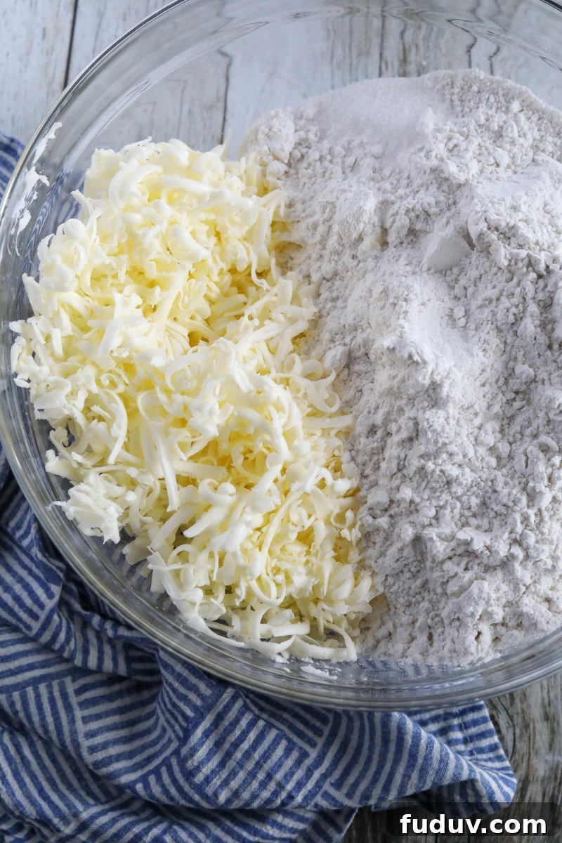 shredded butter and flour in a glass bowl