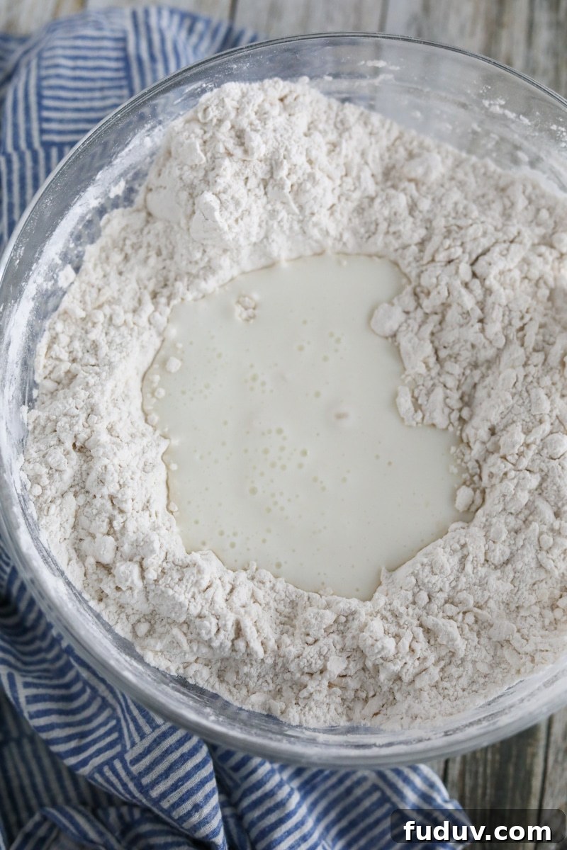 buttermilk being combined with butter and flour