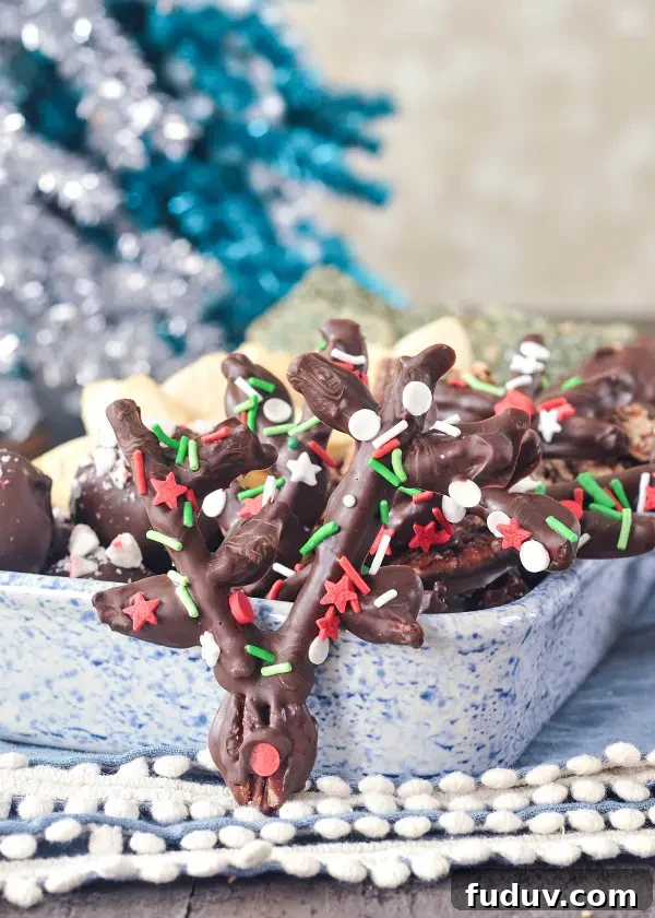 Chocolate Covered Pretzel Reindeer in a holiday cookie tray