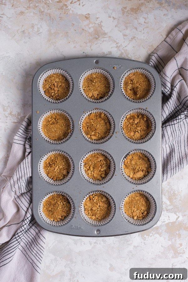 Mini Lemon Cheesecakes Recipe: Zesty Bite-Sized Desserts 5 Crust in liners