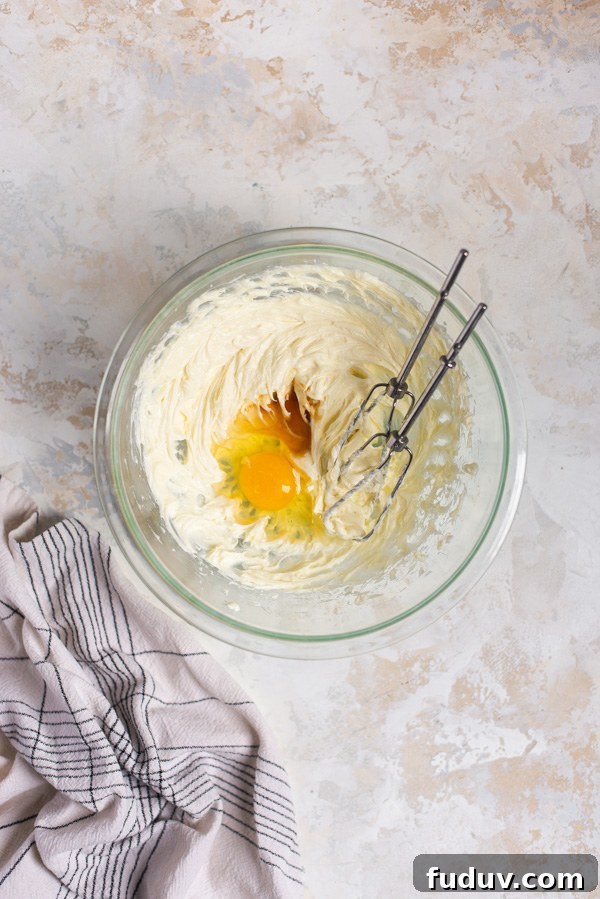 Mini Lemon Cheesecakes Recipe: Zesty Bite-Sized Desserts 7 Cheesecake batter