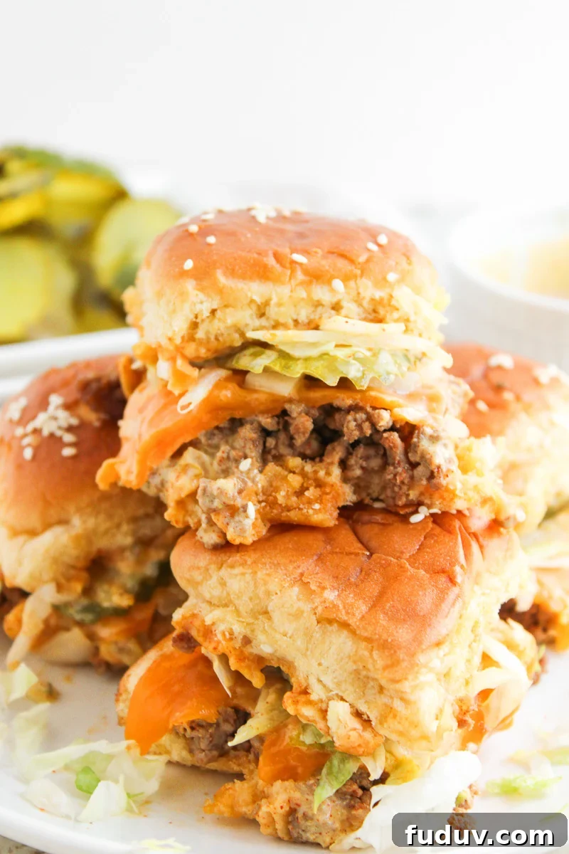 Big Mac sliders stacked on a plate.
