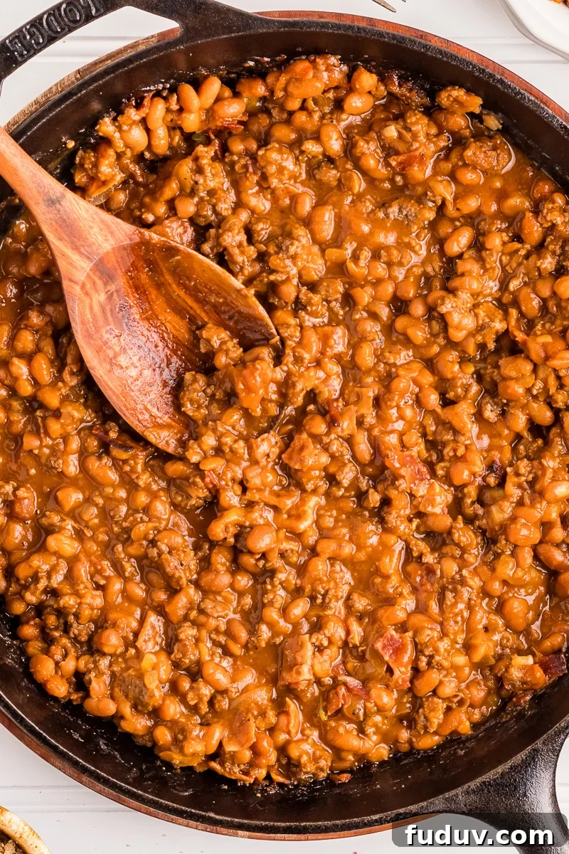 Baked beans in cast iron skillet.