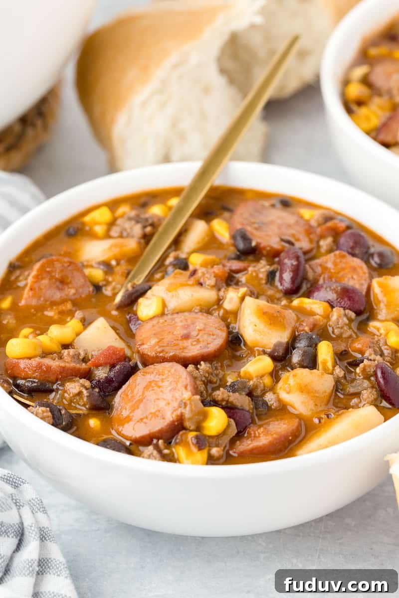 Texas cowboy stew served in a white bowl.