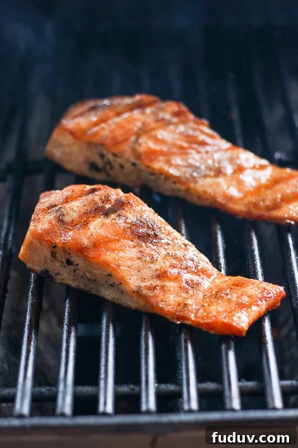Two salmon filets on the grill. 
