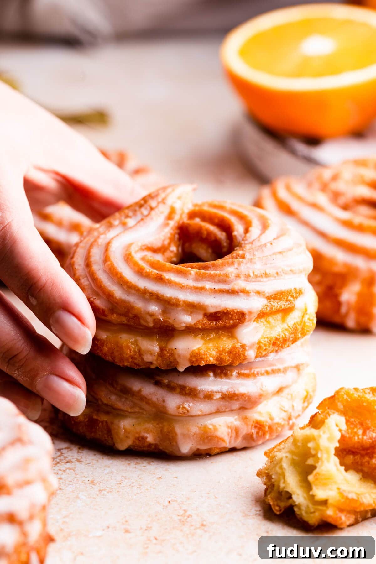 How to Make Classic French Crullers at Home 7 super close up side view at two french cruller doughnuts stacked on top of each other