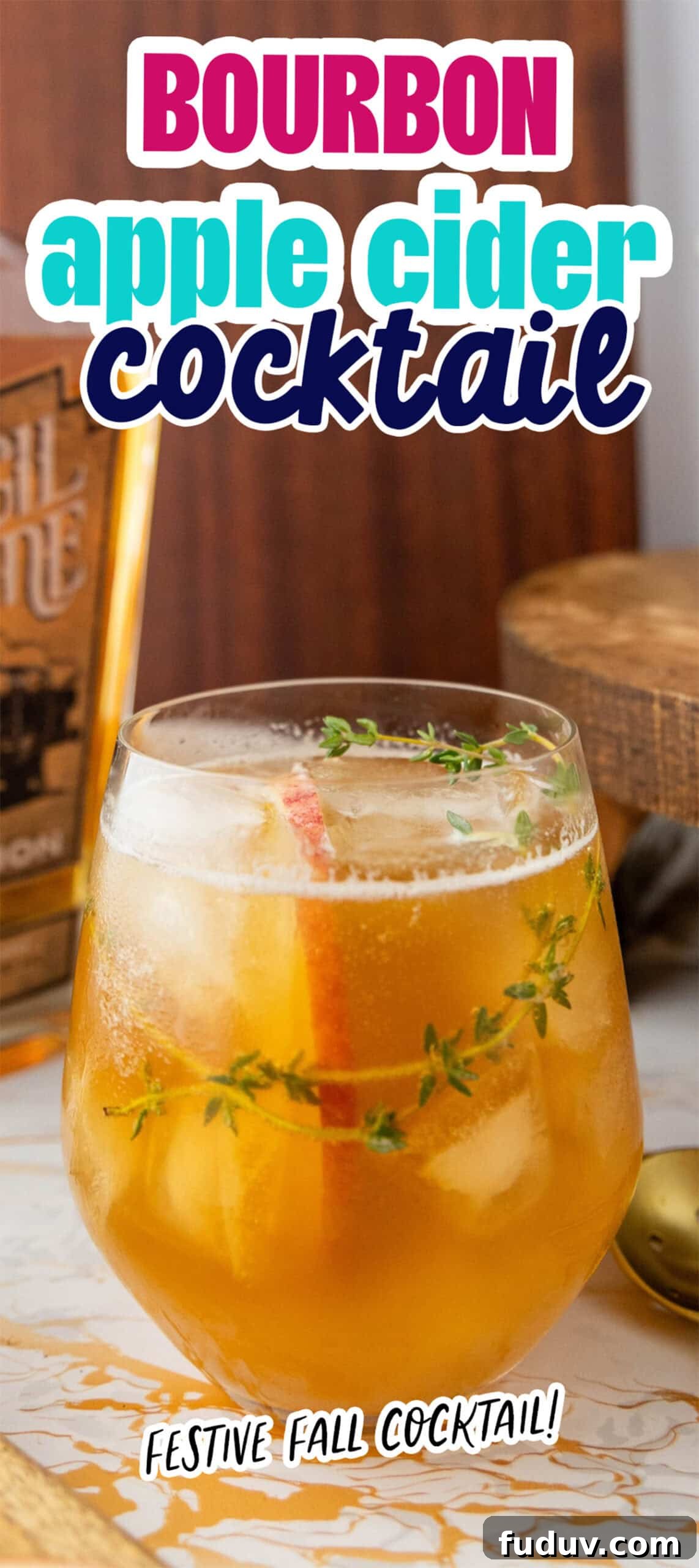 A glass of bourbon apple cider cocktail with a stick of cinnamon and sprigs of thyme, labeled "Bourbon apple cider cocktail" and "Festive fall cocktail!.