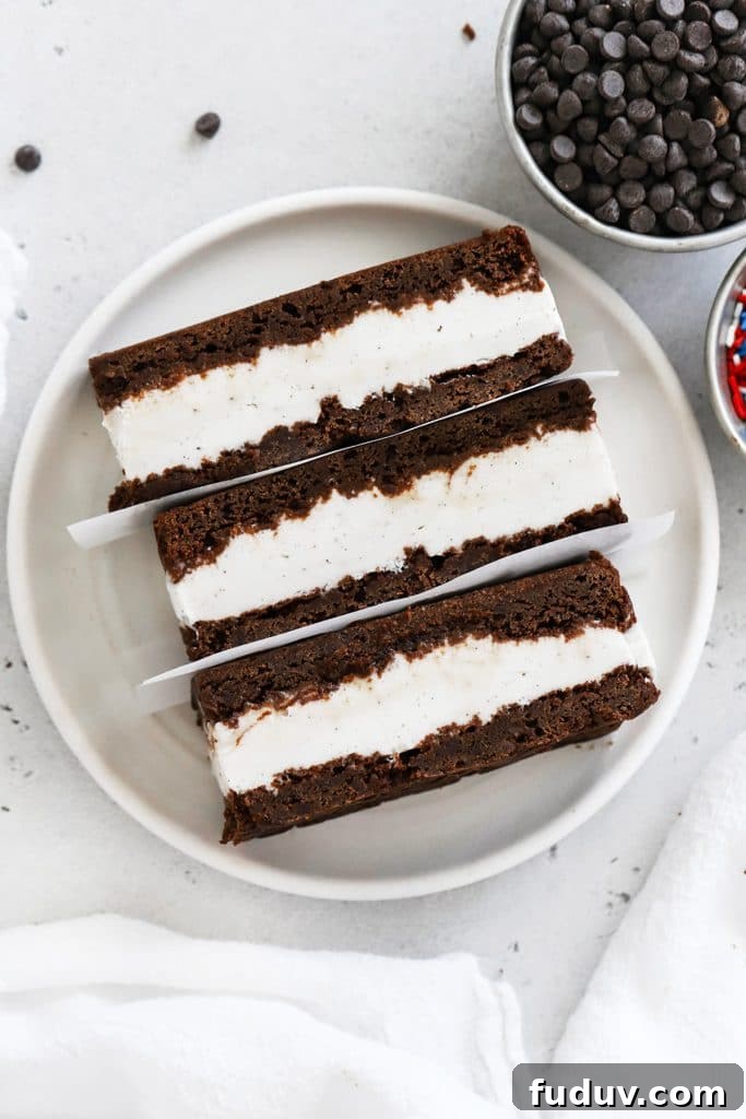 Overhead view of three gluten free ice cream sandwiches on a plate