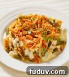 A delicious way of making a traditional green bean casserole with Alfredo sauce.