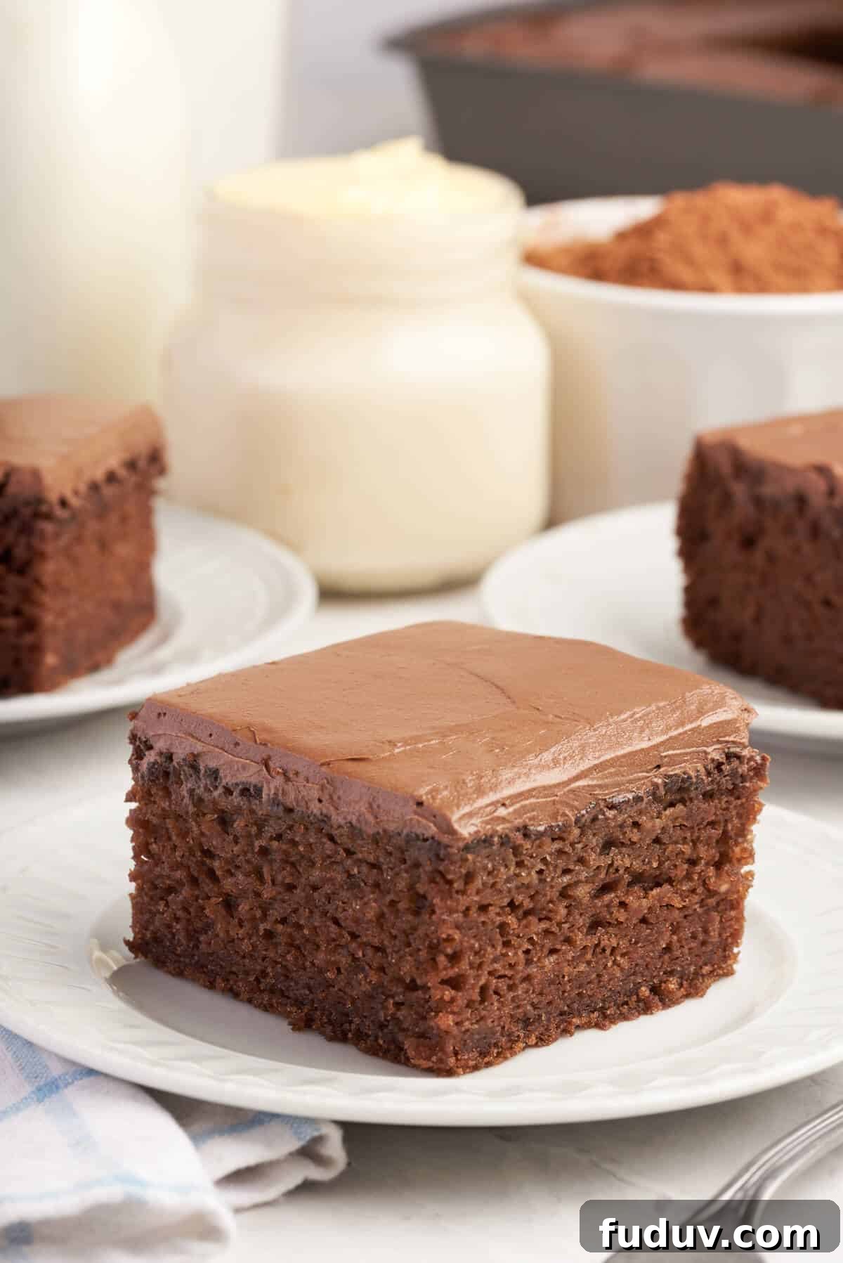 A piece of cake on a plate.