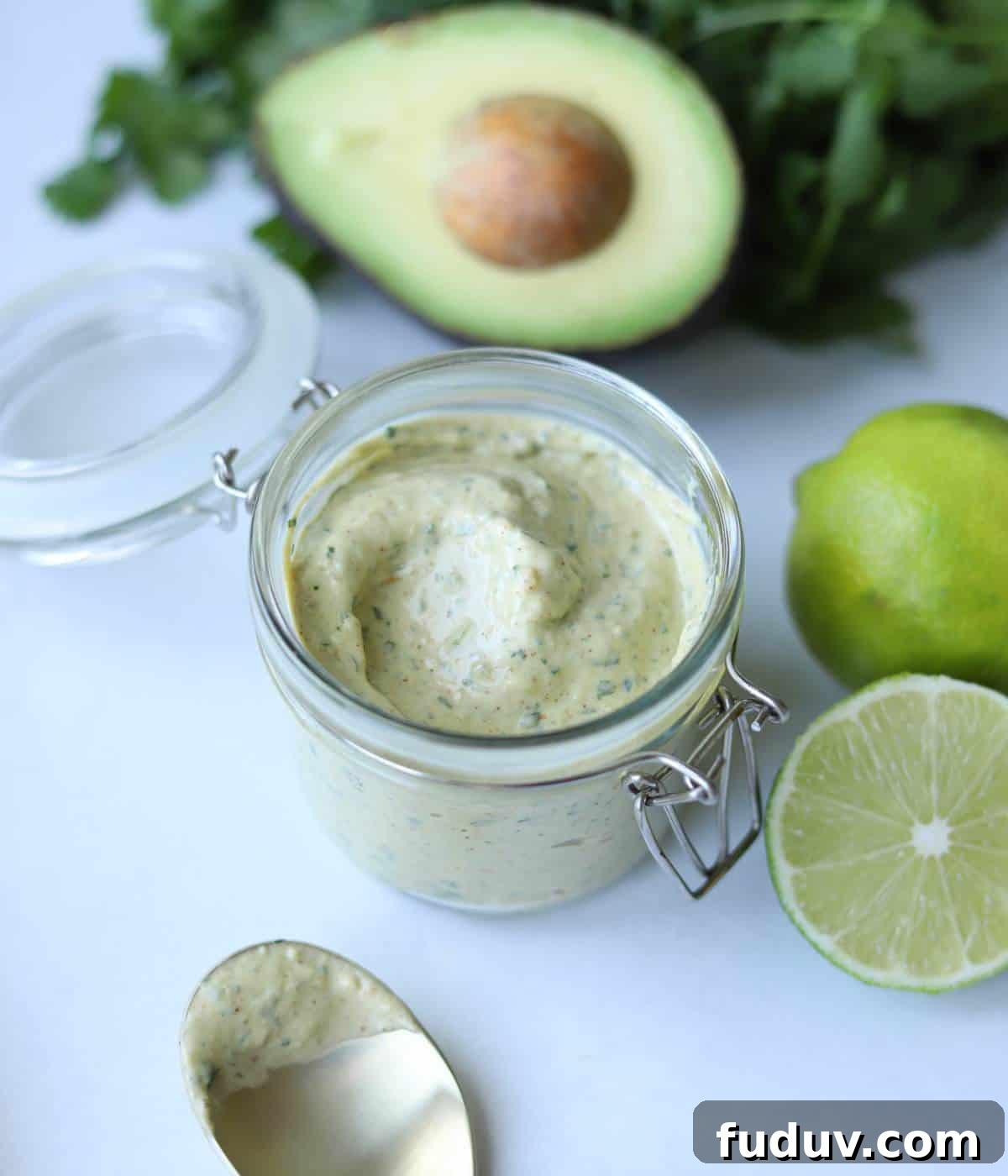 Creamy Lime Aioli Recipe — Zesty Sauce for Sandwiches & Seafood 2 Lime aioli sauce in glass jar.