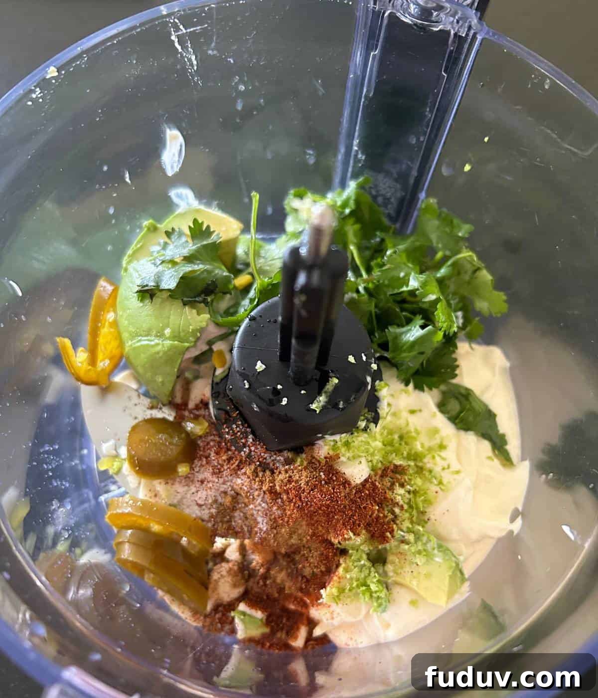 Creamy Lime Aioli Recipe — Zesty Sauce for Sandwiches & Seafood 4 Ingredient for lime sauce in food processor before blending.