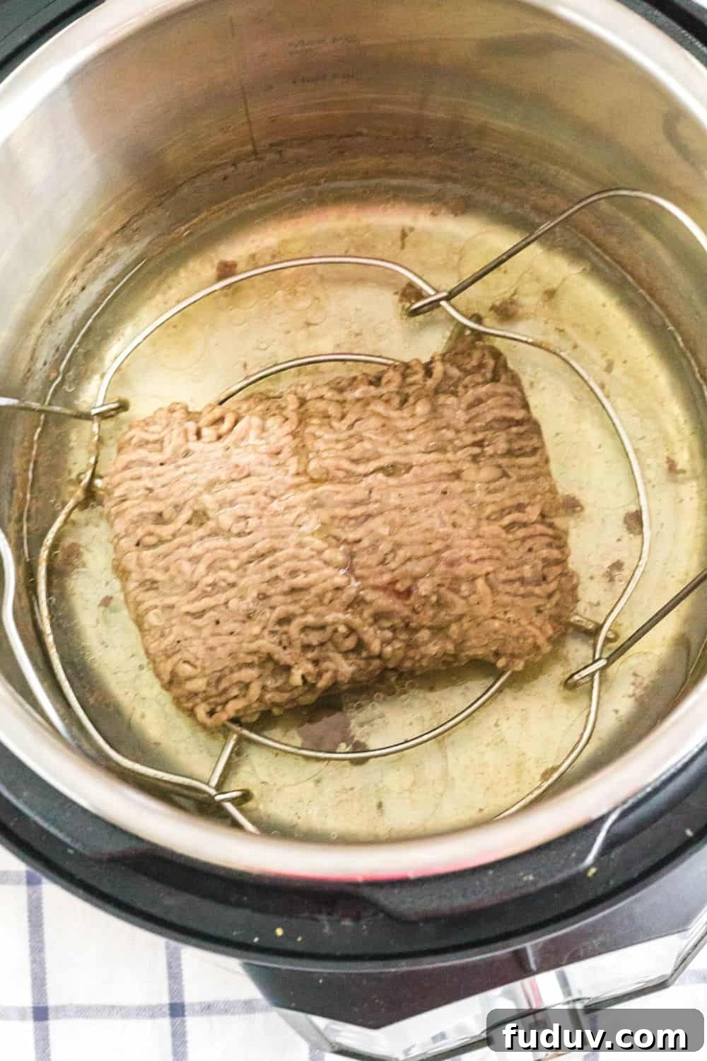 freshly cooked pound of frozen ground beef in the Instant Pot