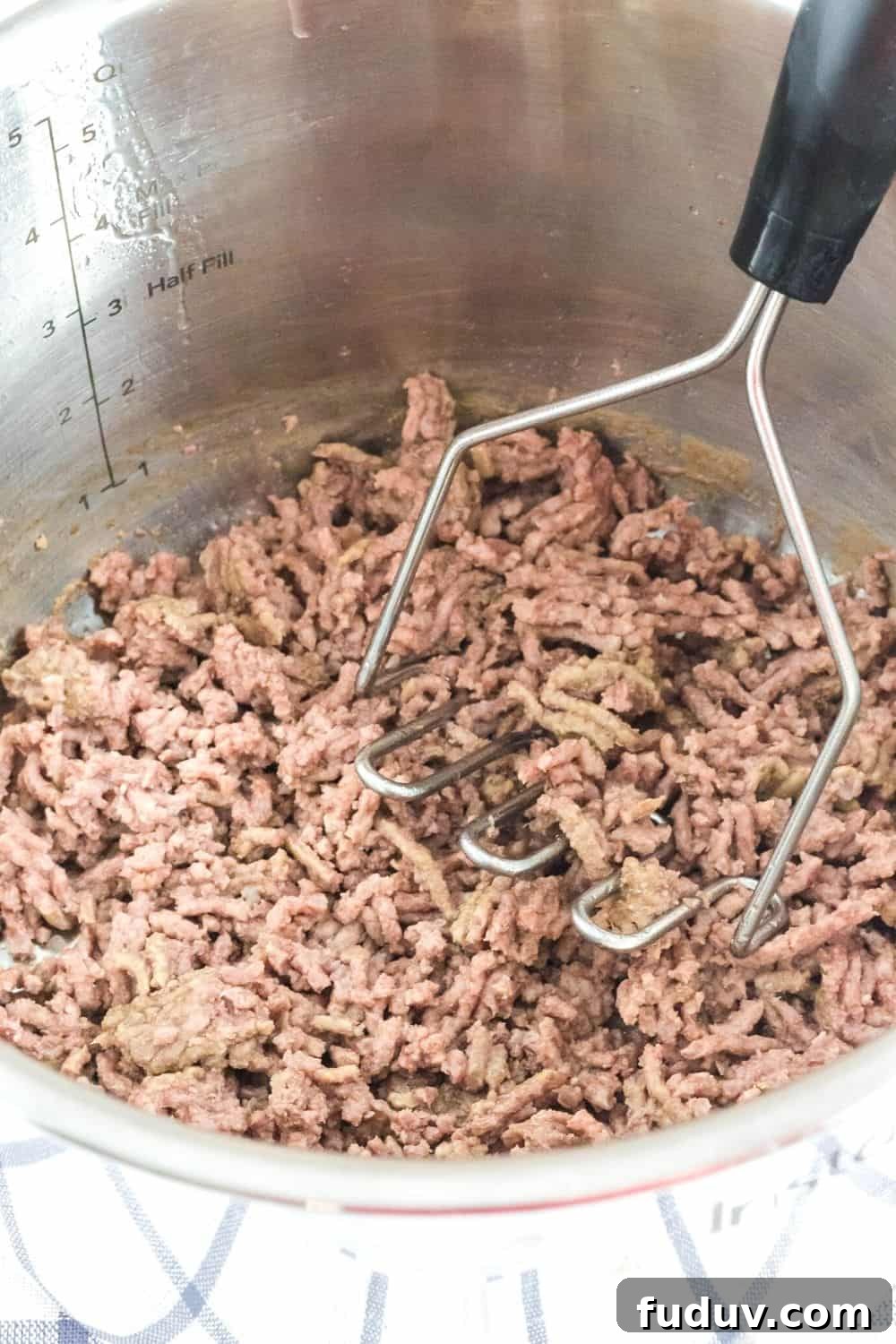 frozen ground beef that was cooked in the Instant Pot and crumbled using a potato masher