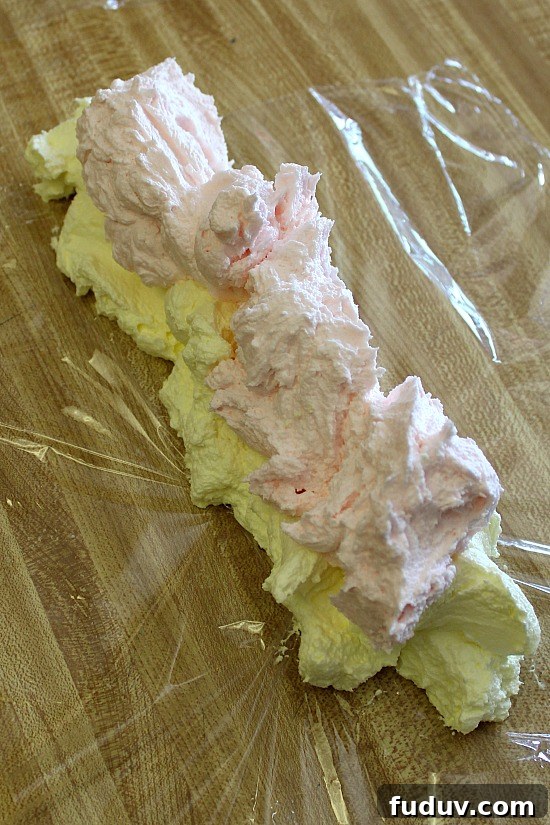 Layers of frosting on clear wrap.