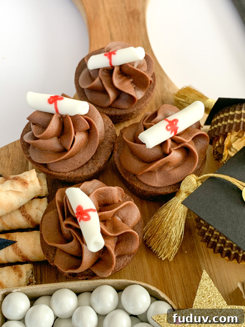 Graduation Dessert Board Ideas for Party-Worthy Celebration Treats 16 graduation dessert board, graduation charcuterie board, best graduation snack board ideas, best grad party ideas, best graduation open house party ideas, easy graduation food dessert snack appetizer recipes, best graduation decor ideas, graduation cap ferrero rocher, grad paper mache cardboard letter number candy dish, graduation cap oreos, graduation book yearbook hersheys nugget candy, graduation diploma cookies, graduation diploma brownies cupcakes, graduation dipped strawberries, fondant graduation decorations