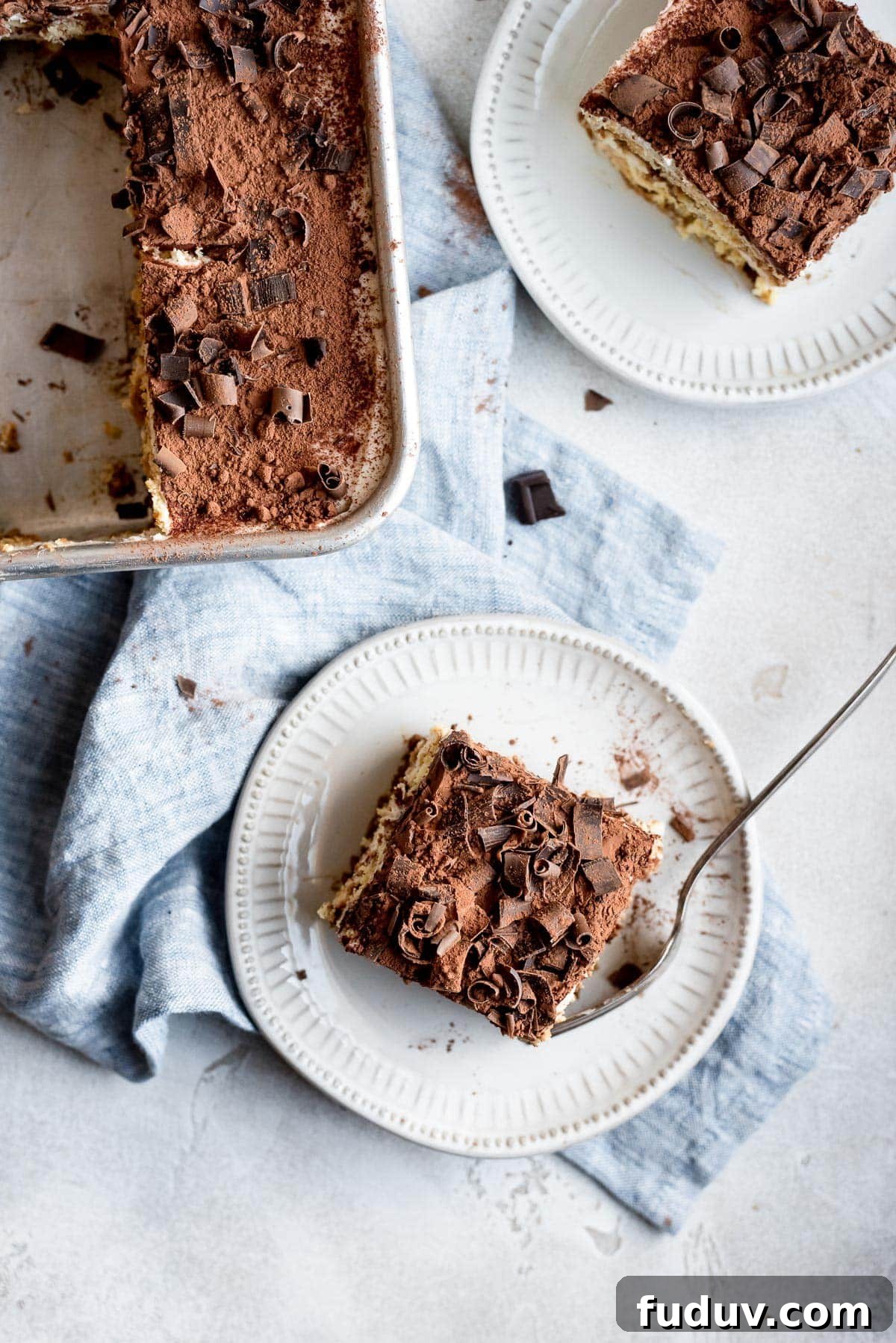 pverheat pan and plate both filled with the tiramisu cake