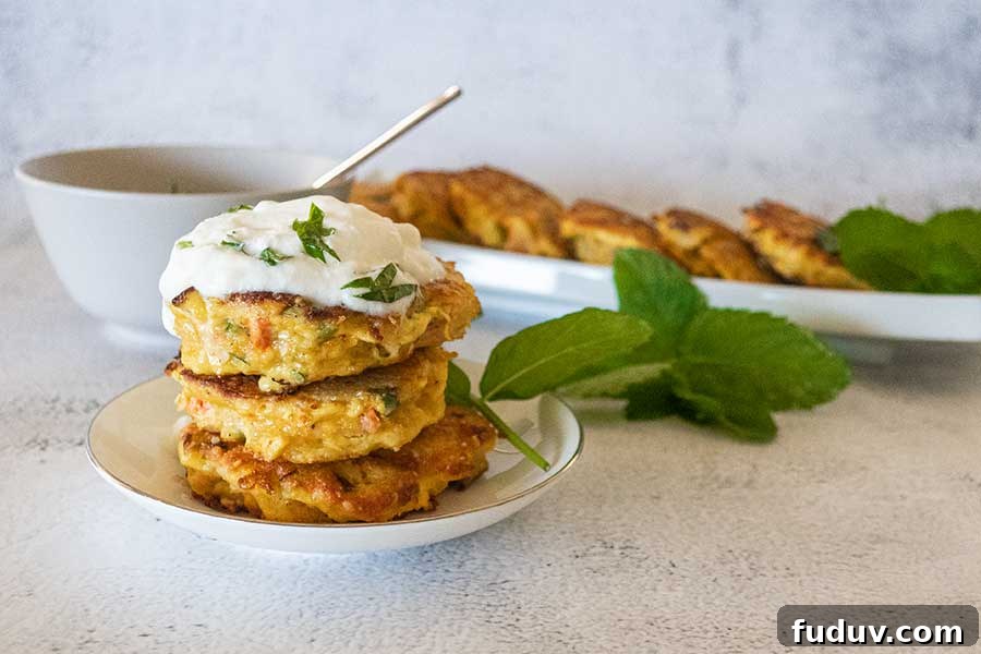 three salmon burgers on a plate made with water chestnuts, keto