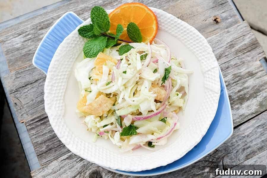 low-carb cabbage and fennel, salad with fruit in a bowl