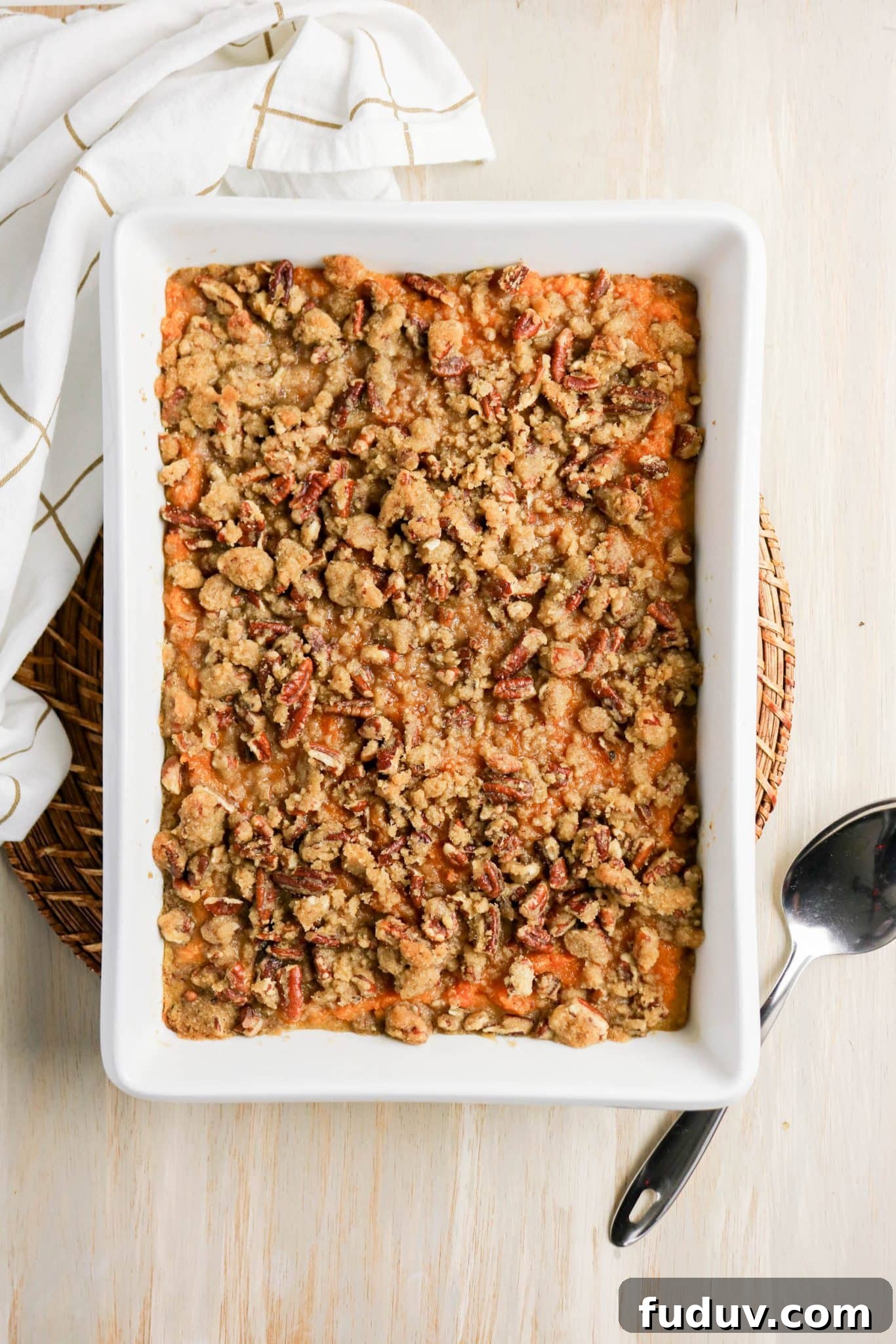 Sweet Potato Casserole Made with Canned Yams — Quick Holiday Side 2 Baked sweet potato casserole with pecan topping fresh from the oven - Hostess At Heart
