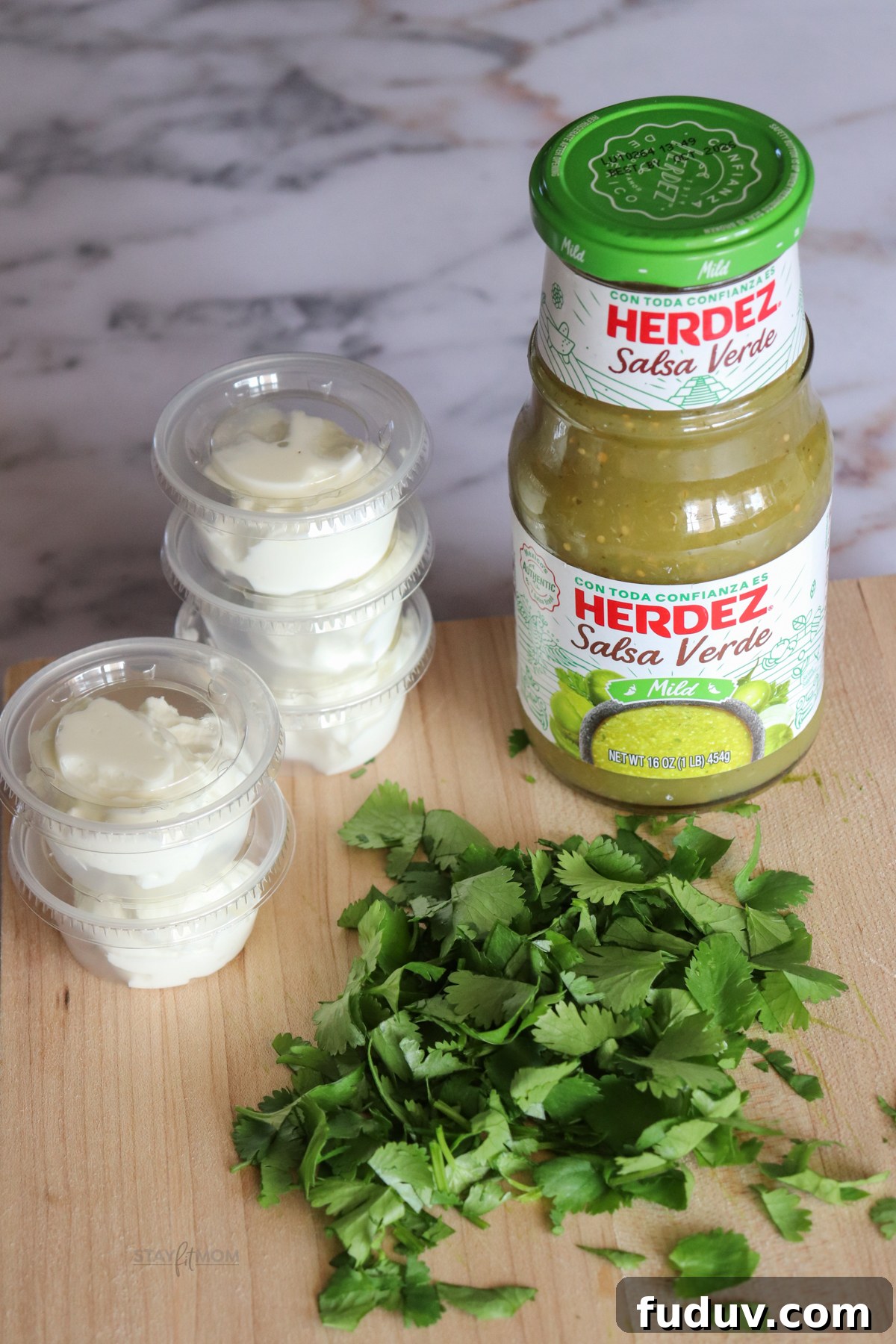 Image showing Herdez Salsa Verde, Greek yogurt in 2 oz containers and chopped cilantro.