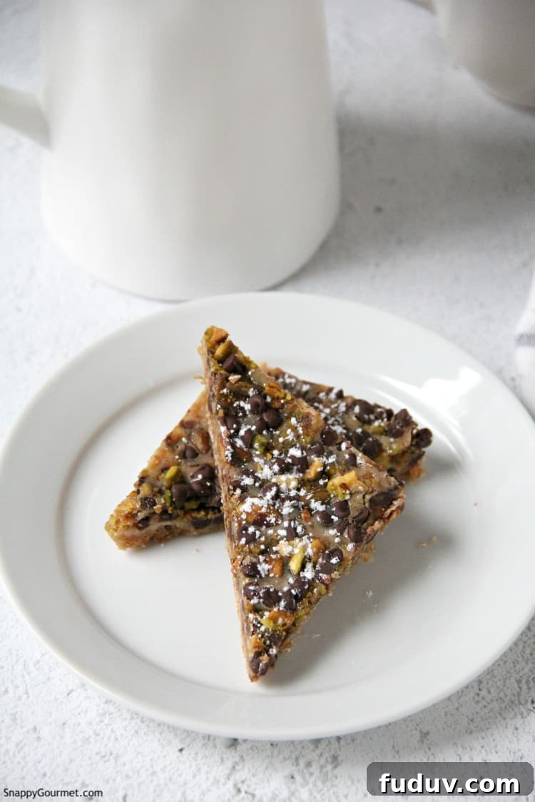 Cannoli Magic Bars recipe - delicious cookie bars perfect for Christmas Cannoli Magic Bars on plate