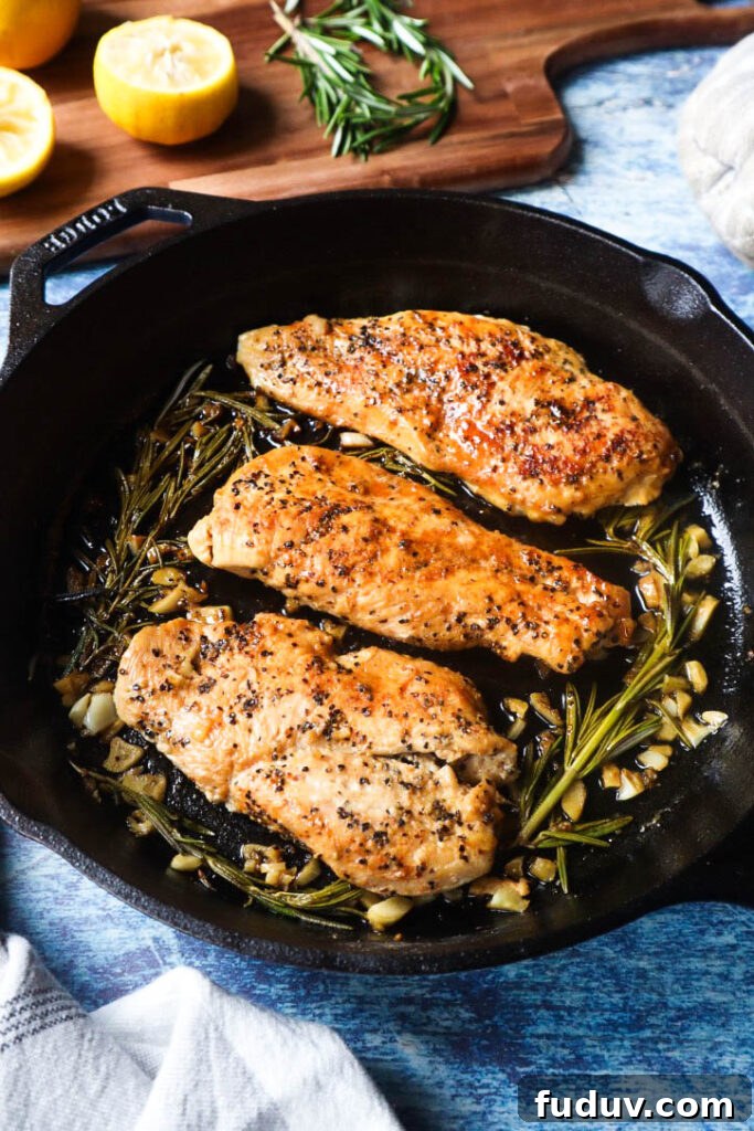 Cast iron skillet chicken breast with lemon and rosemary