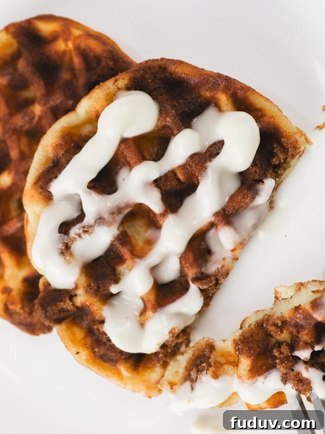 25 High-Protein, Low-Carb Breakfast Recipes to Start Your Day 3 Keto Coffee Cake Chaffle eating with fork