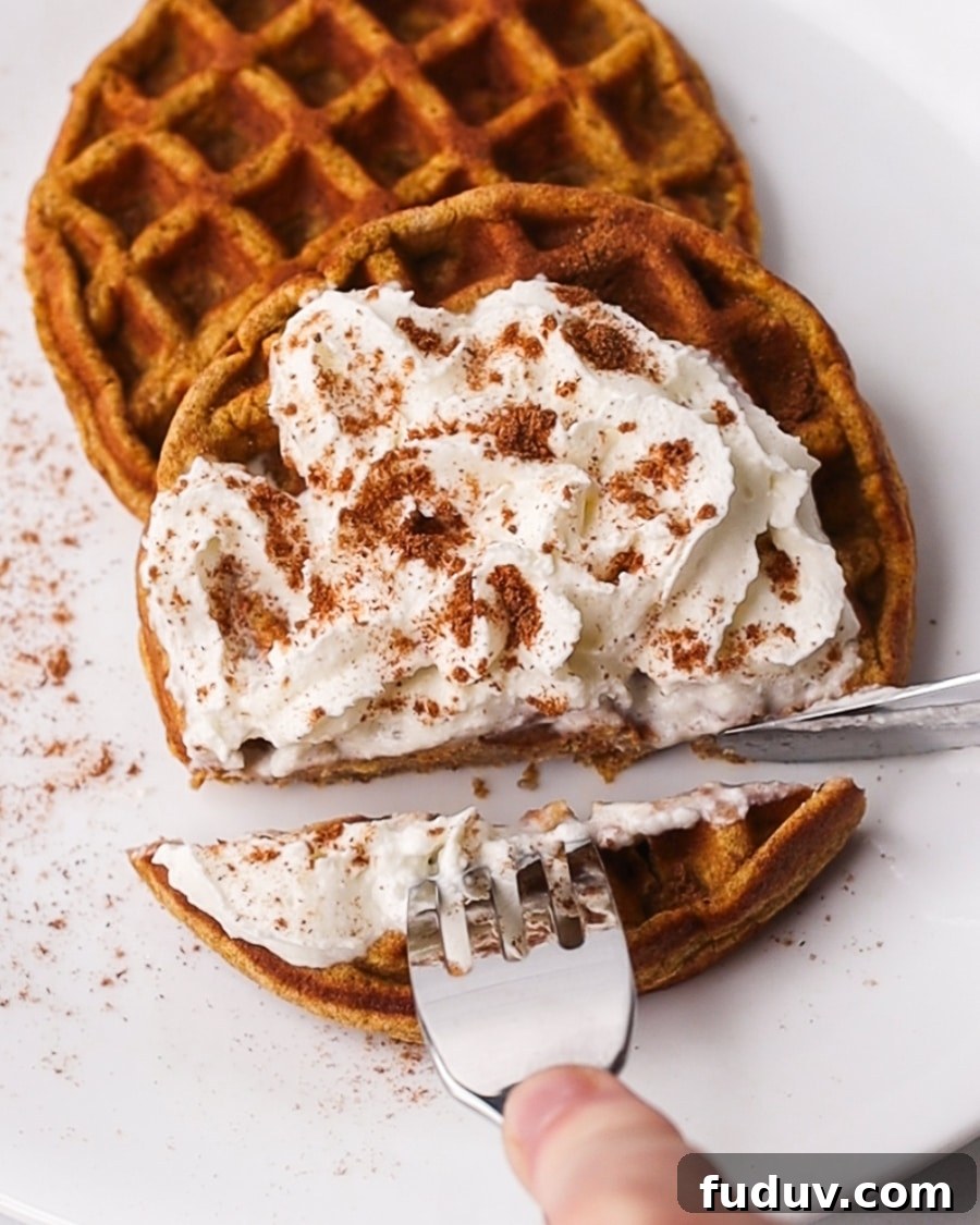 25 High-Protein, Low-Carb Breakfast Recipes to Start Your Day 7 cutting into chaffles