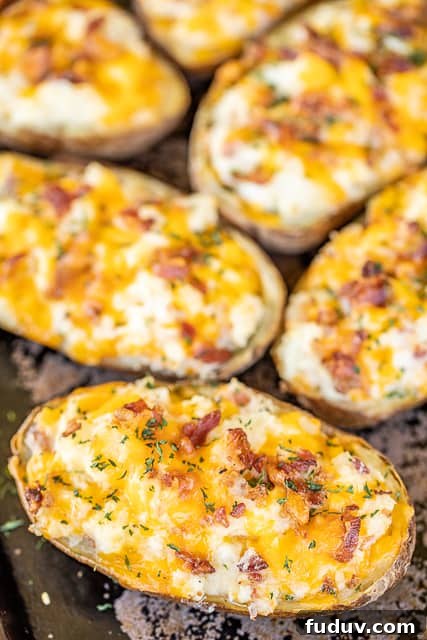 twice baked potatoes on a baking sheet