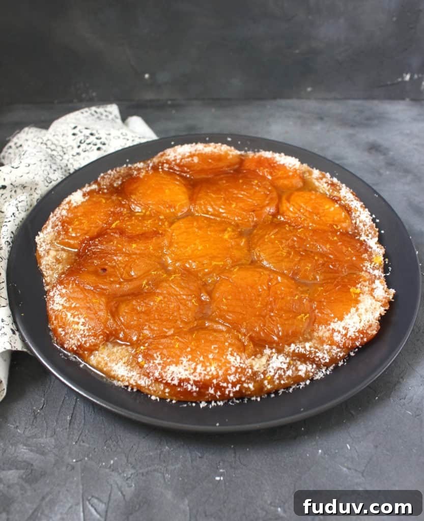Tarte Tatin on a black plate