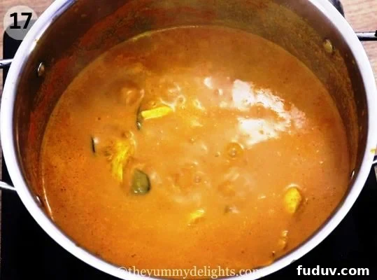 image of cooked mangalorean fish curry or meen ghassi in the pot.