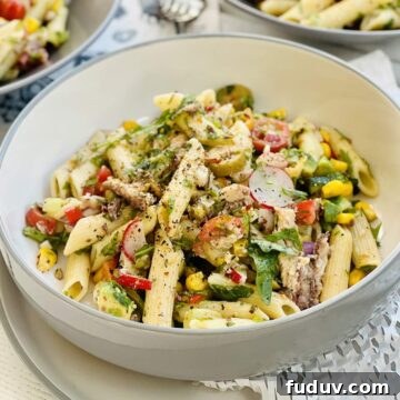 Spanish sardines pasta penne with sweet corn, radish black pepper and herbs