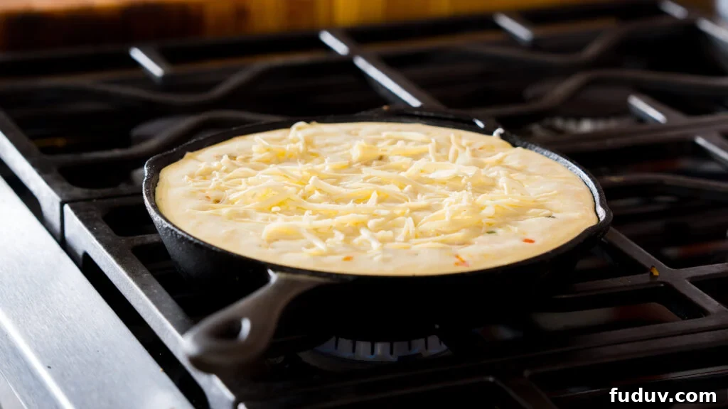 Protein-Packed Baked Eggs with Cottage Cheese 4 Baked cottage cheese eggs in a cast iron pan.