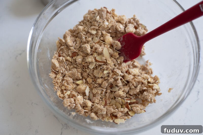 Almond slices are added to the oat crisp topping.