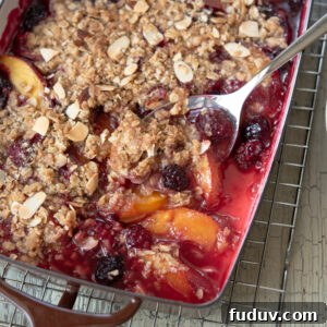 Nectarine and blackberry are baked together with crunchy oat topping
