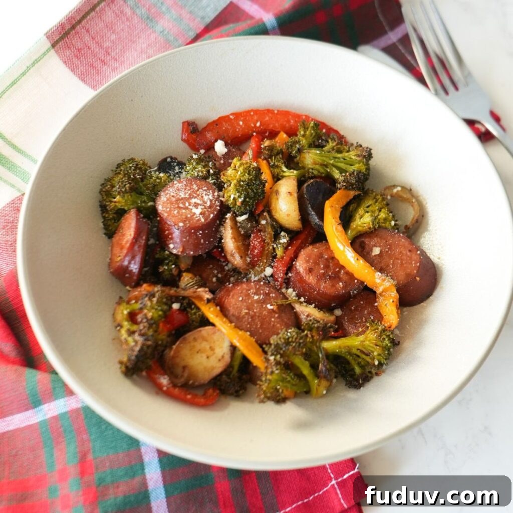 Sausage, peppers, onions, potatoes and broccoli with parmesan cheese. 