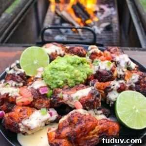 The Nacho Wings sitting on a serving plate.