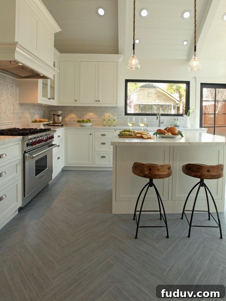 25+ Stunning All-White Kitchen Designs for Timeless Style 11 Neutral Kitchen With Gray Herringbone-Patterned Flooring | 25+ Dreamy White Kitchens