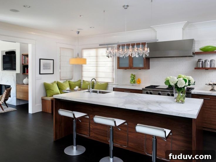 25+ Stunning All-White Kitchen Designs for Timeless Style 25 Contemporary kitchen with white marble topped island | 25+ Dreamy White Kitchens