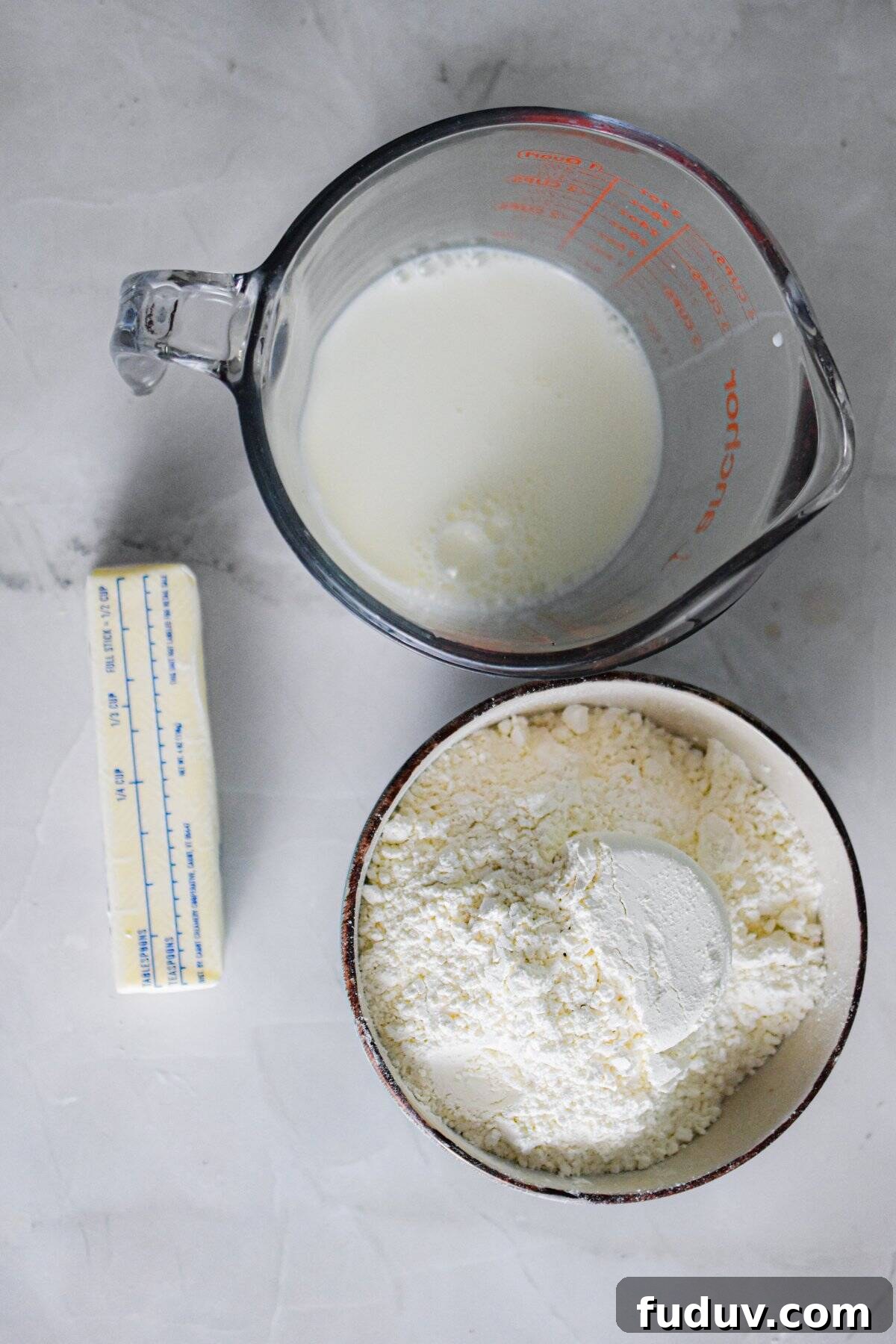 The ingredients for the self rising flour biscuits are laid out.