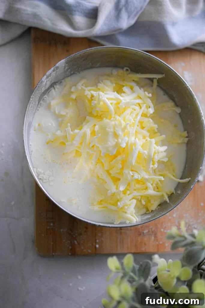 The milk is added to the bowl.