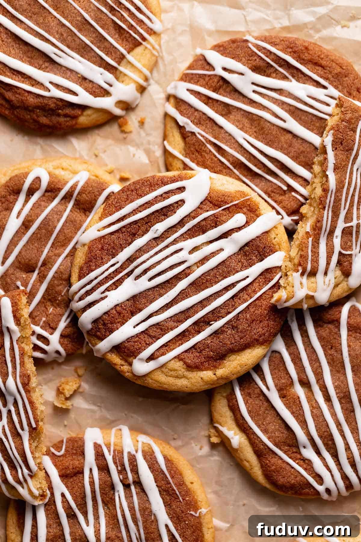 Cinnamon roll cookies with cinnamon sugar tops and cream cheese icing.