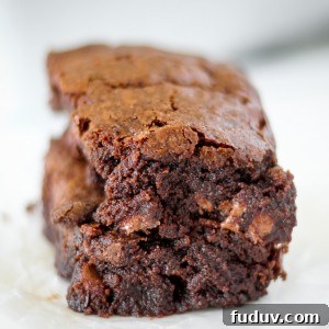 Classic Homemade Brownie Recipe for Fudgy, Chewy Results 10 Thick homemade brownies with crispy edges, chewy middles, and rich chocolate flavor.