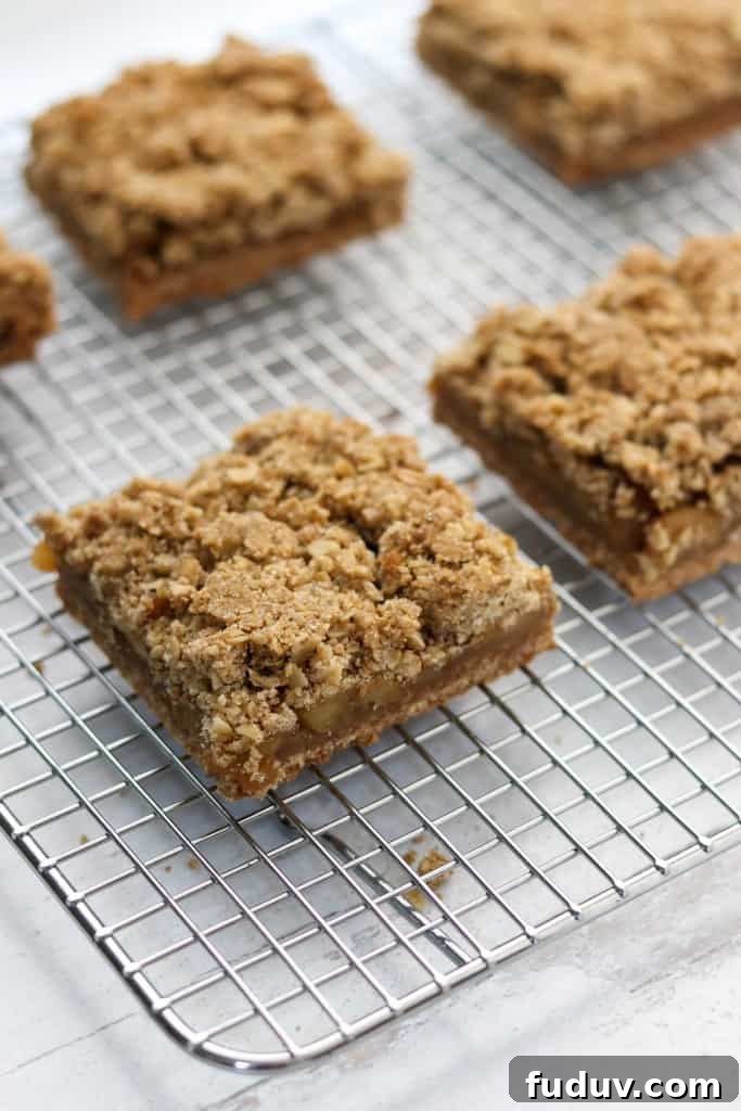 Apple Crumble Bars with Oats and Rye on a cooling rack