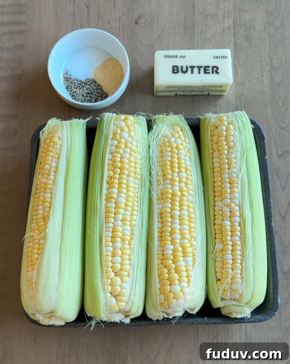 corn in husks, butter, seasonings.