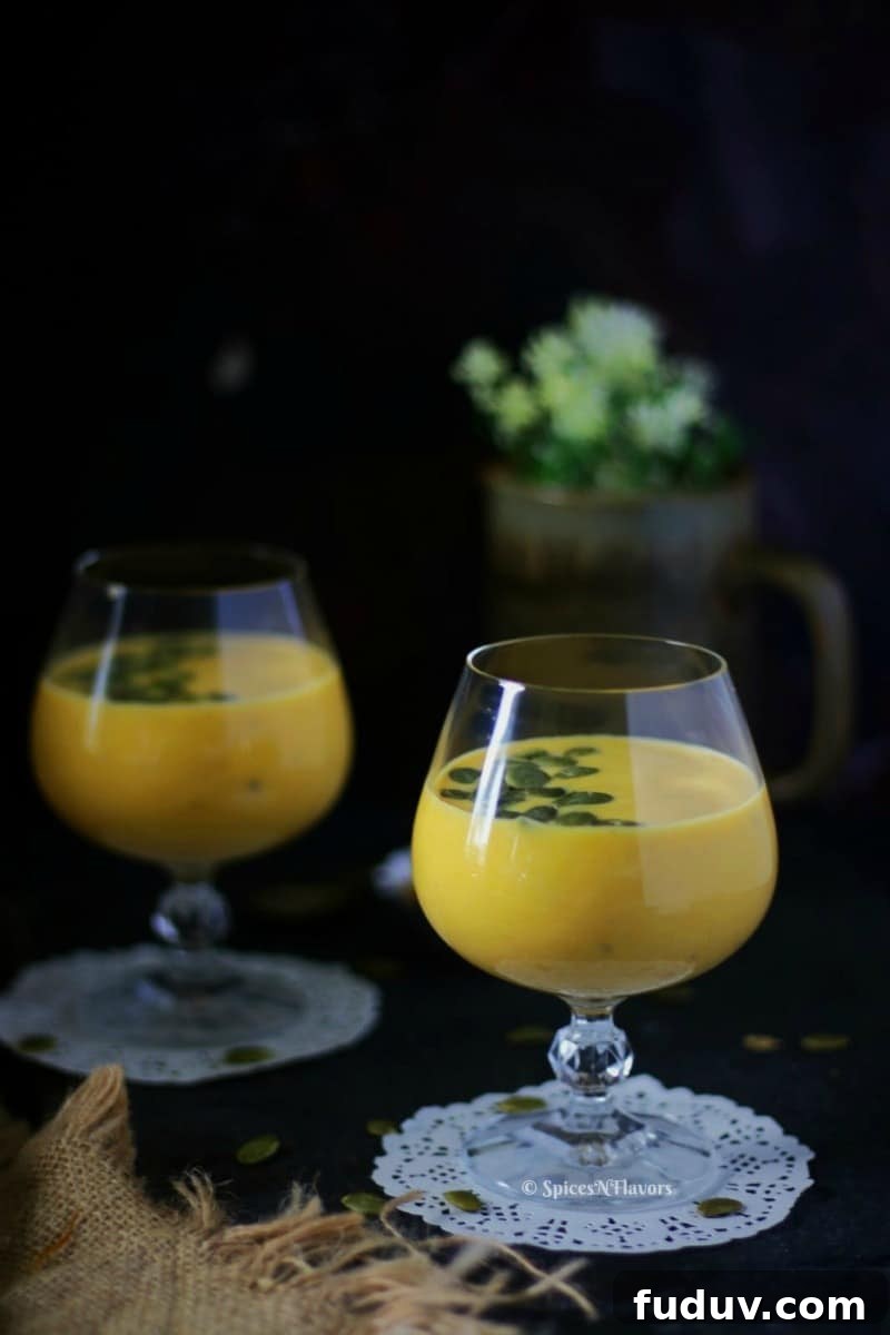 vertical image of pumpkin custard or kaddu ki kheer being served in glasses