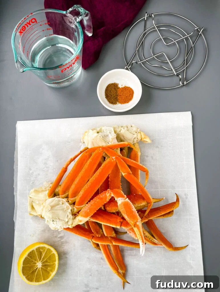 fresh crab legs, spices, water, lemon, and trivet on a flat surface
