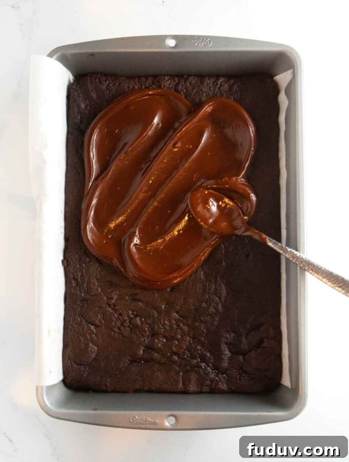 Thin Mint Cookie Bars Recipe with Chocolate Ganache 10 9x13 pan of chocolate thin mint cookie bars with chocolate coating spread on top